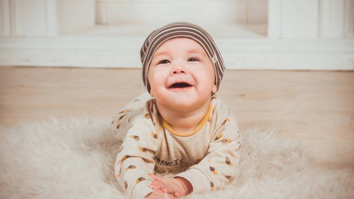 cute baby healthy smiling on the floor