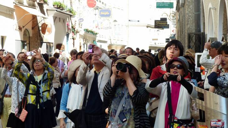 Japan tourists taking photos of G20 event