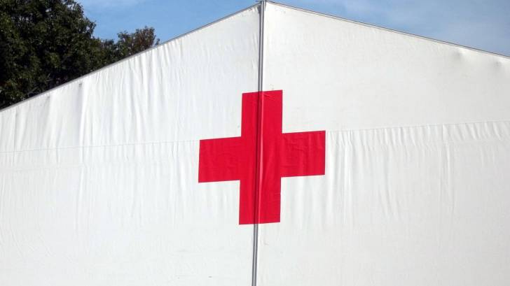 red cross tent to help