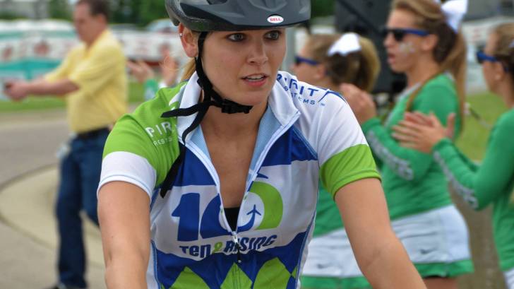 woman riding a bike in a charity event