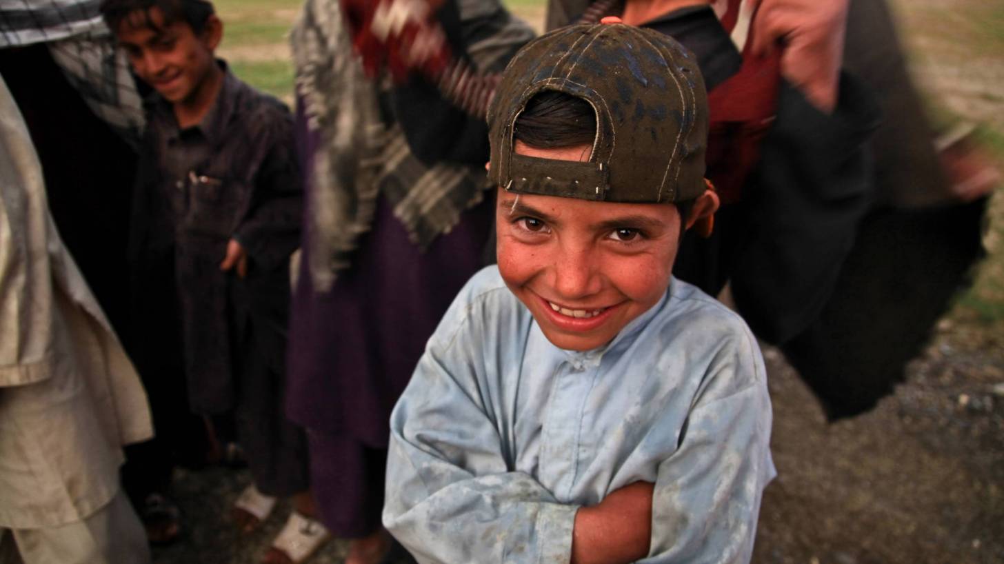 young afghani boy smiling