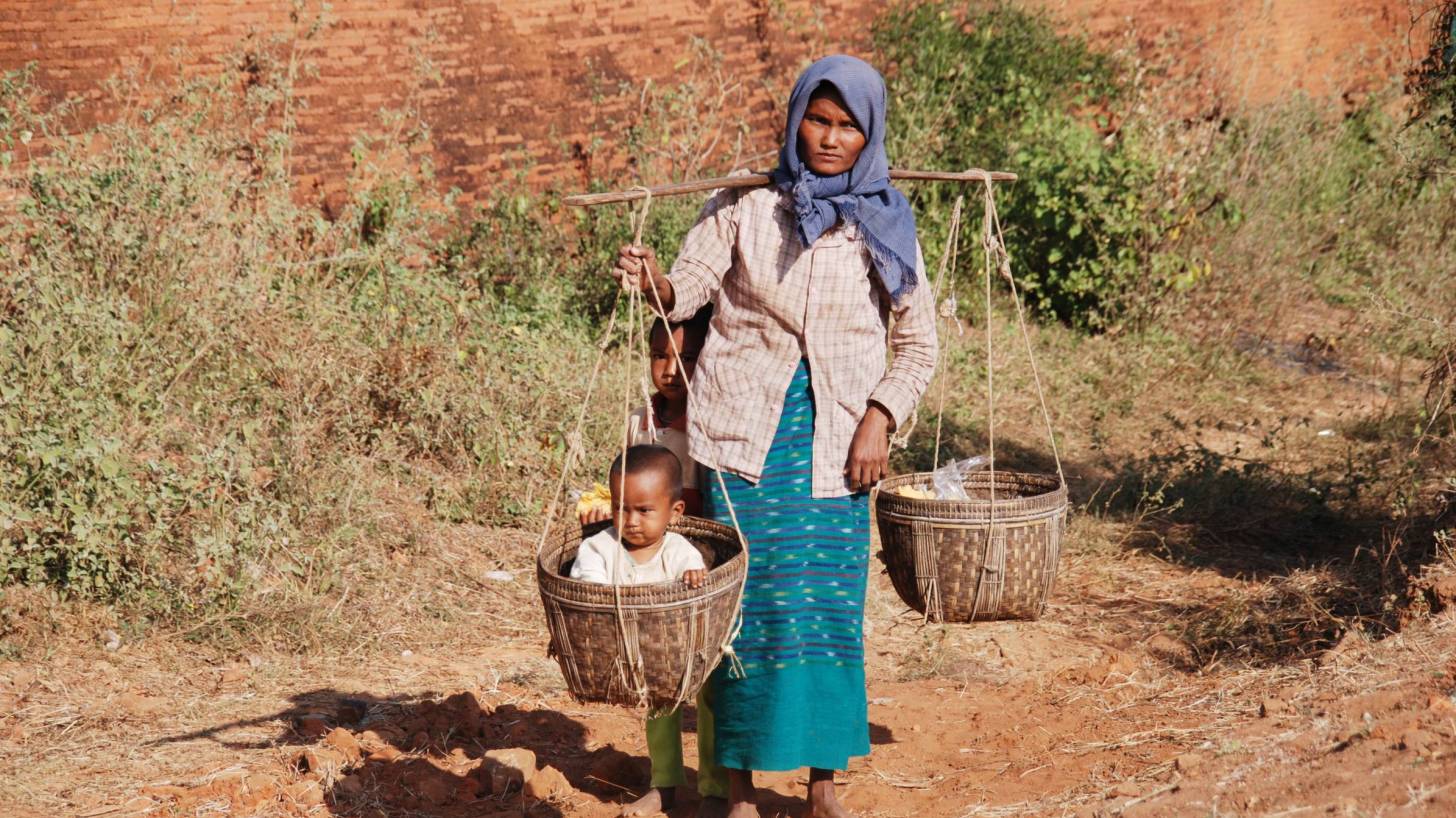 mom and child in a basket in Burma