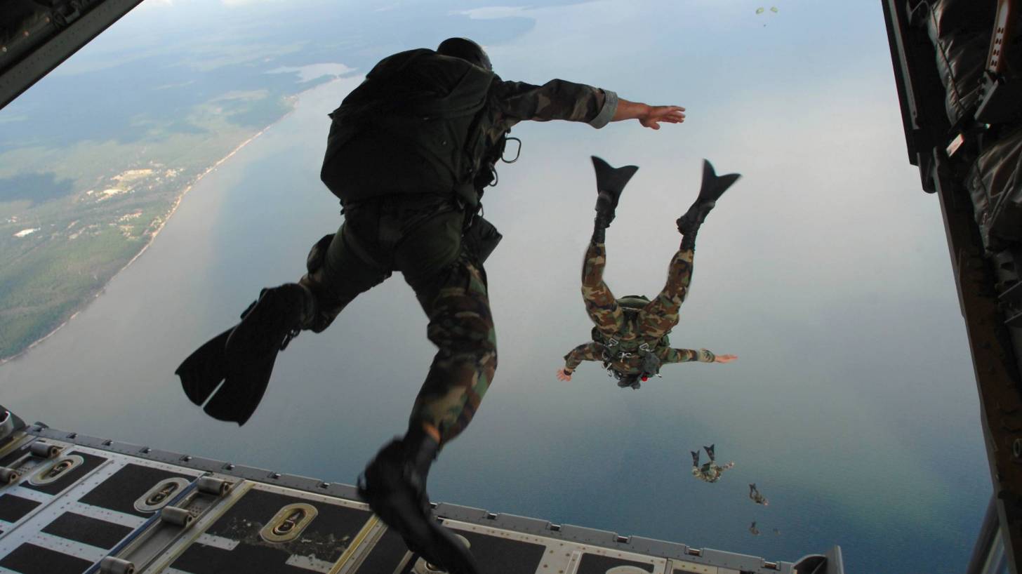 military diving out of plane