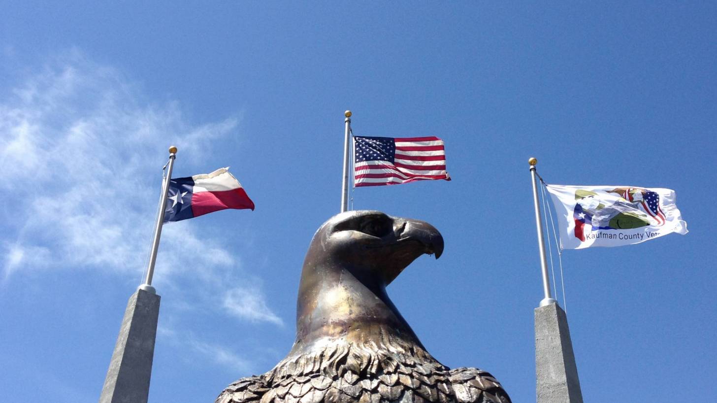 texas, us flag with eagle in front