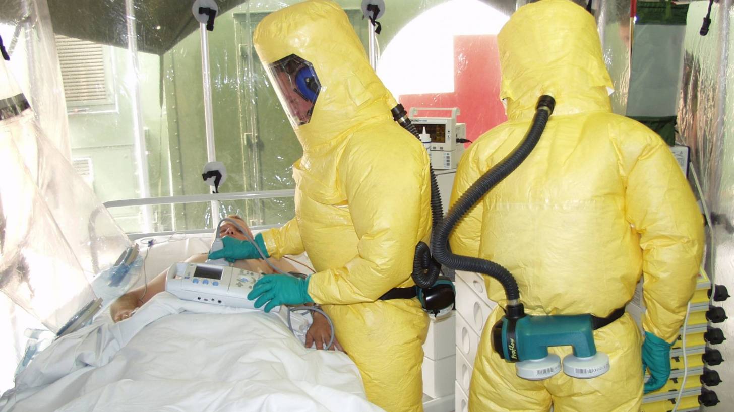 ebola isolation tent with patient and care givers
