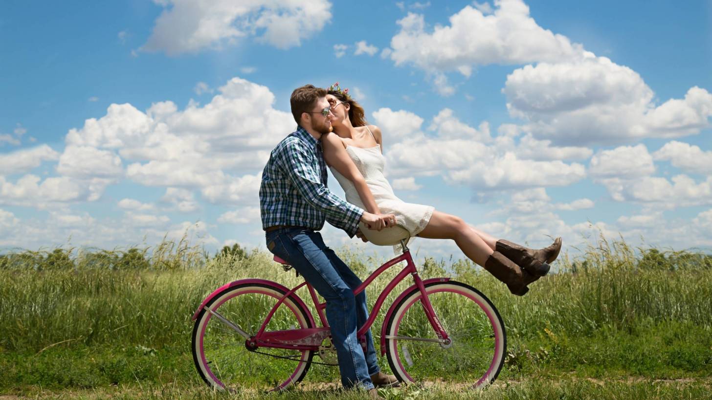 couple riding a bike