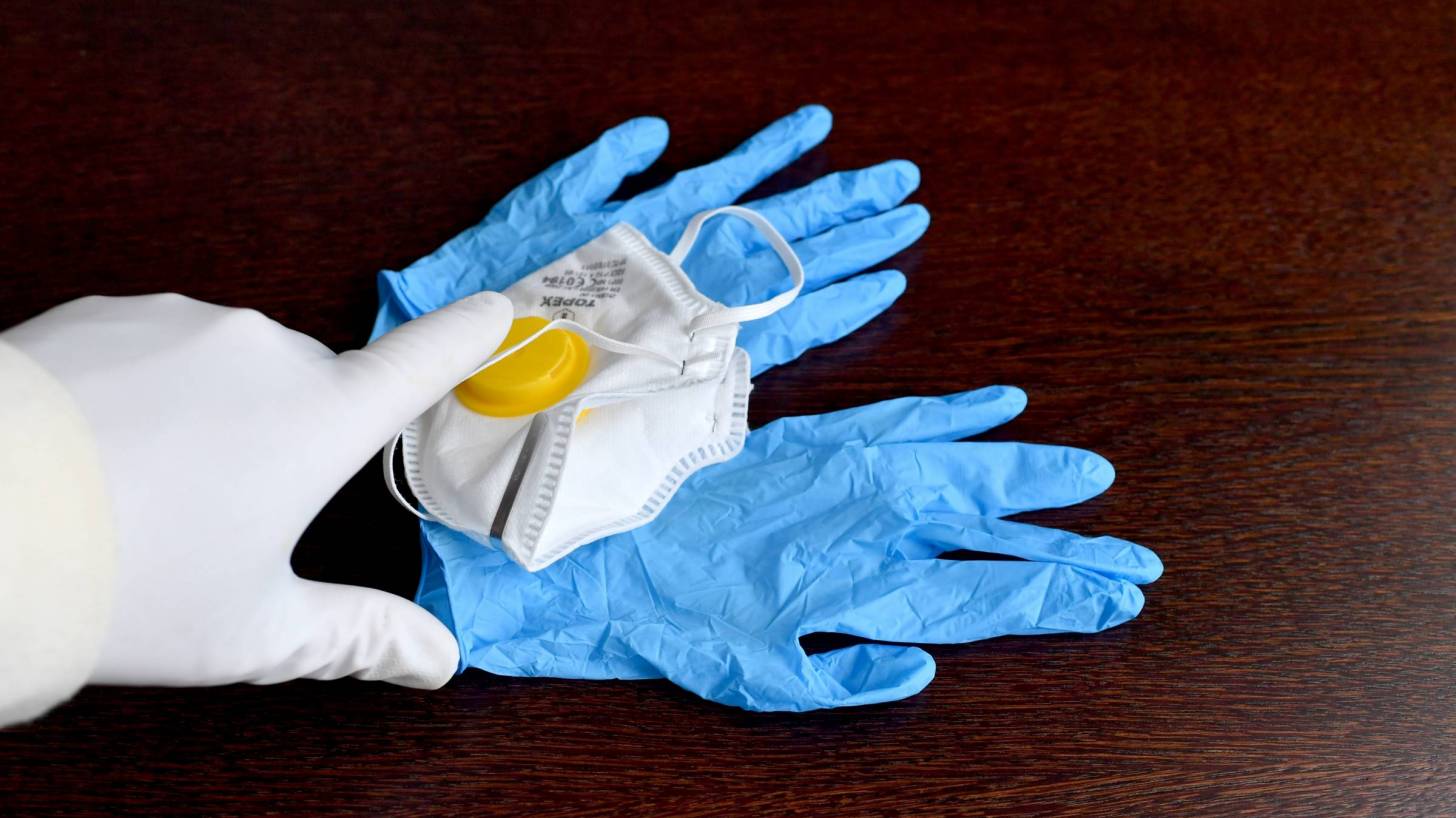 protective mak and gloves for health care workers