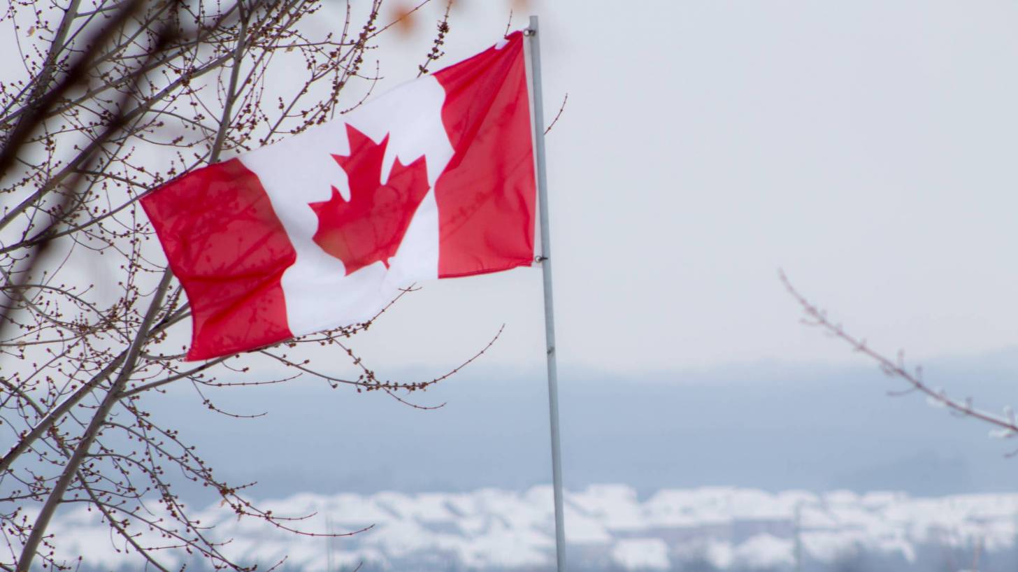 Canadian flag on a winter day