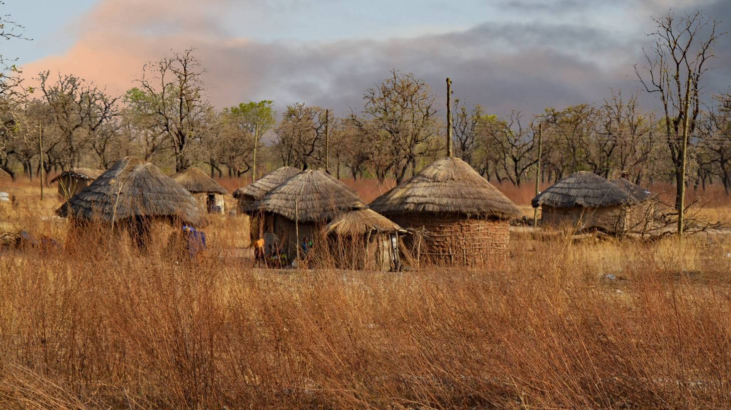 west africa huts in the hot desert
