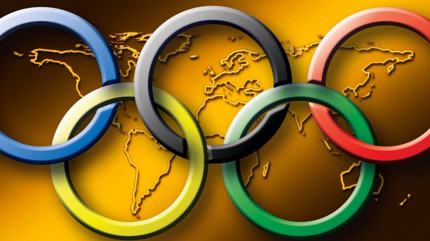 olympic rings on golden map
