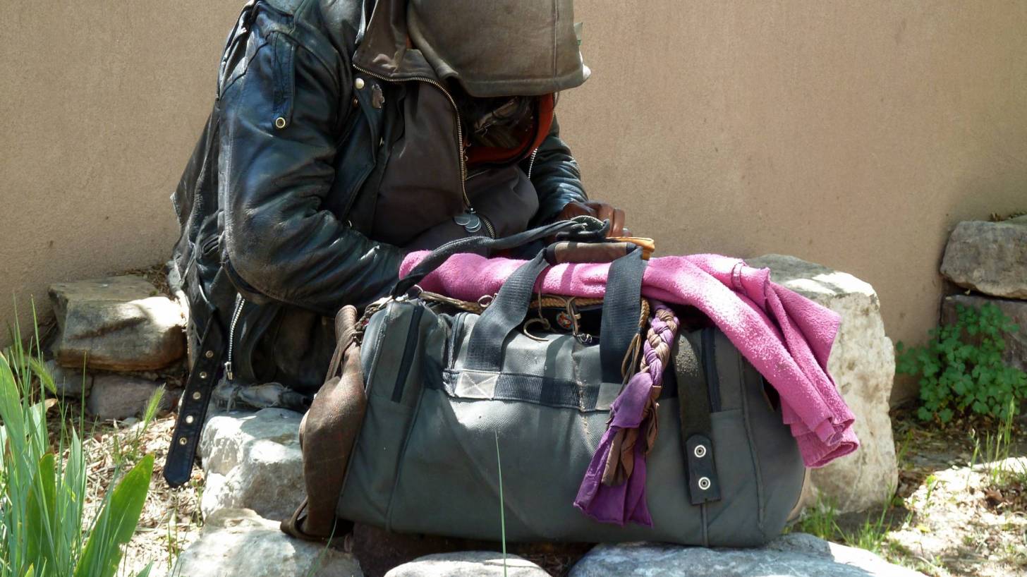 homeless man and his bag