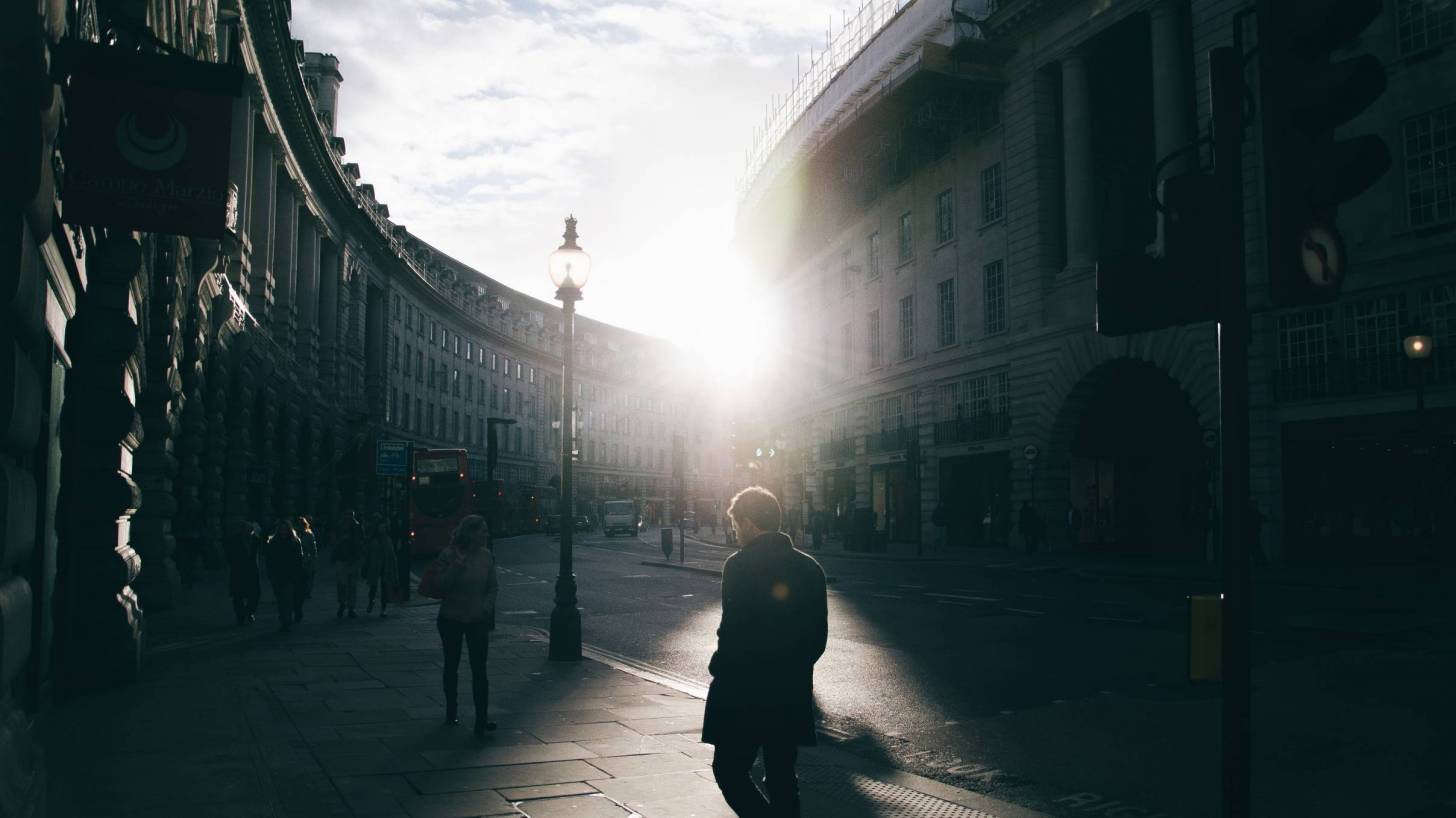 london street with sun peeking out