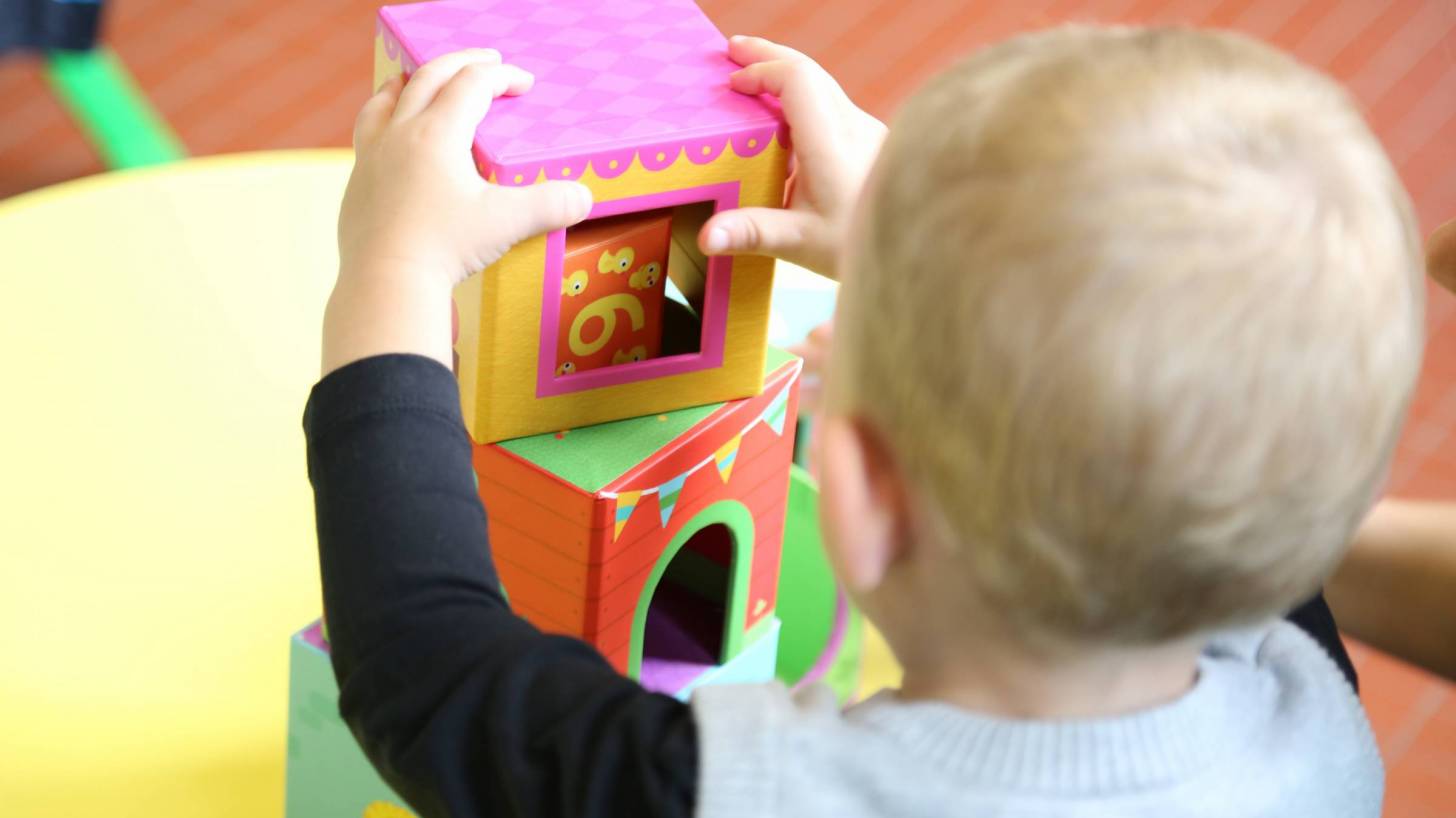 child playing at a day care center
