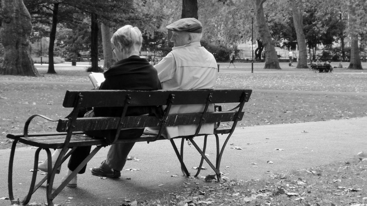 older folks sitting on a bench
