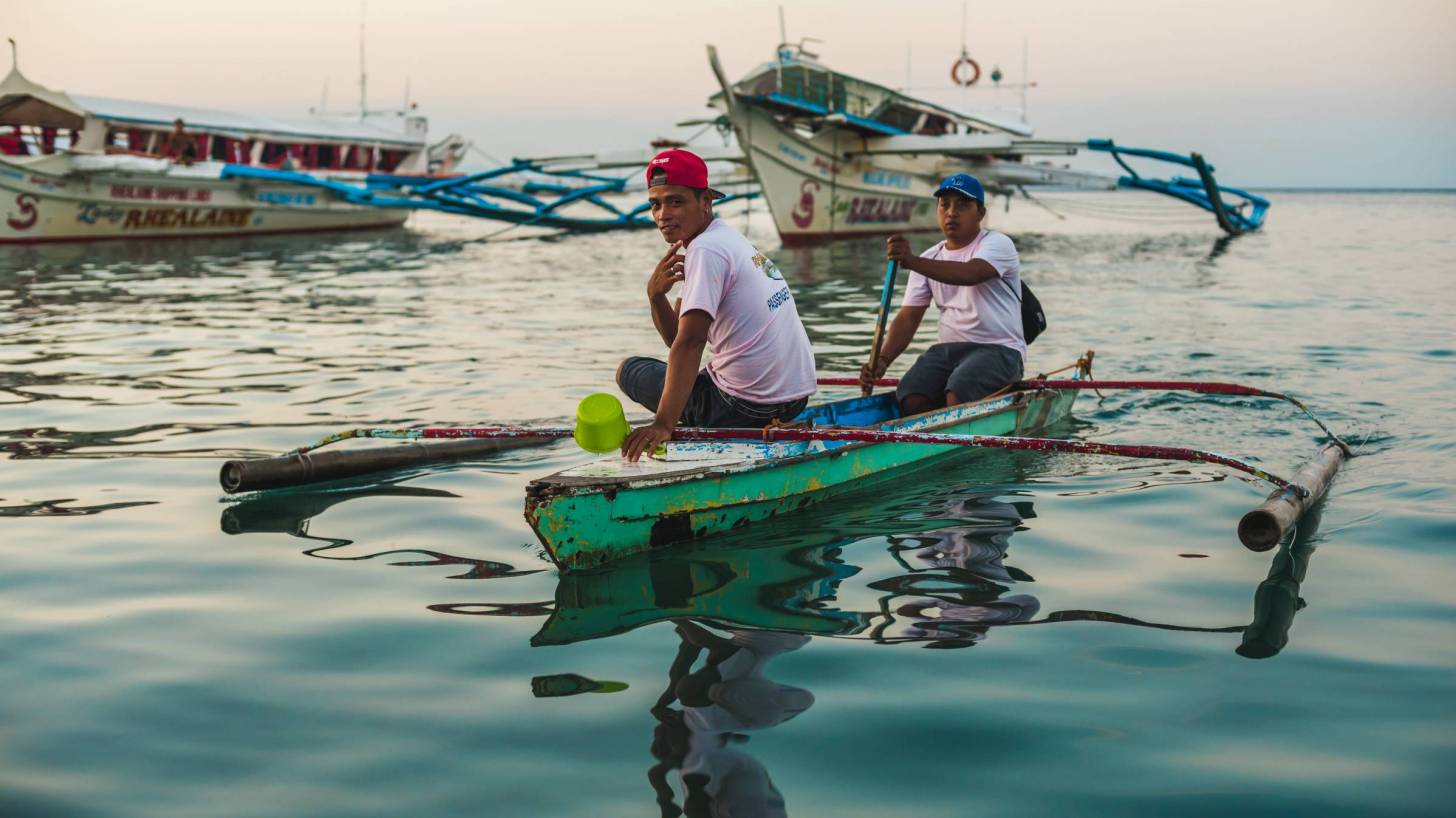 philippine fishermen on a calm sea