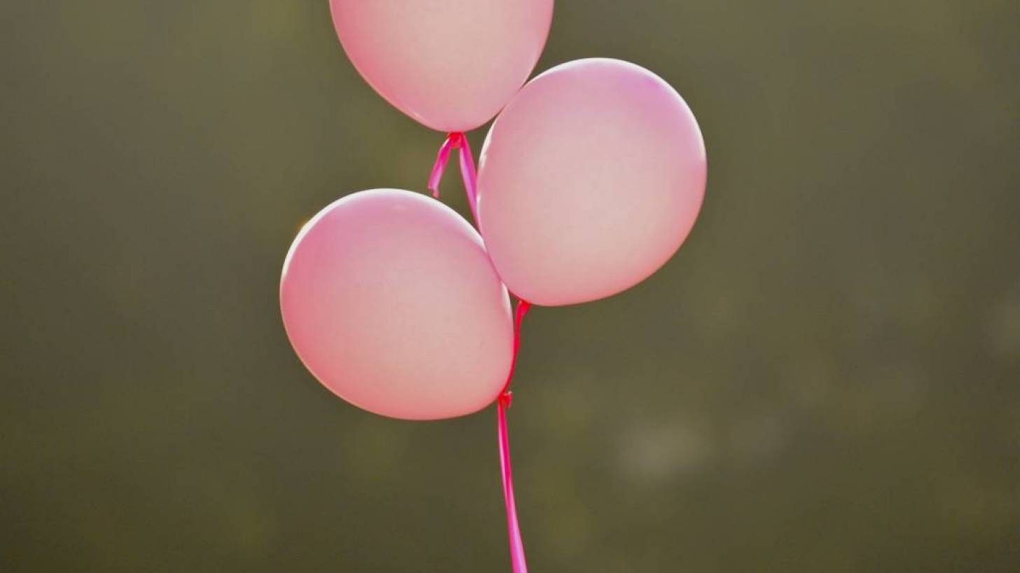 pink balloons celebrating