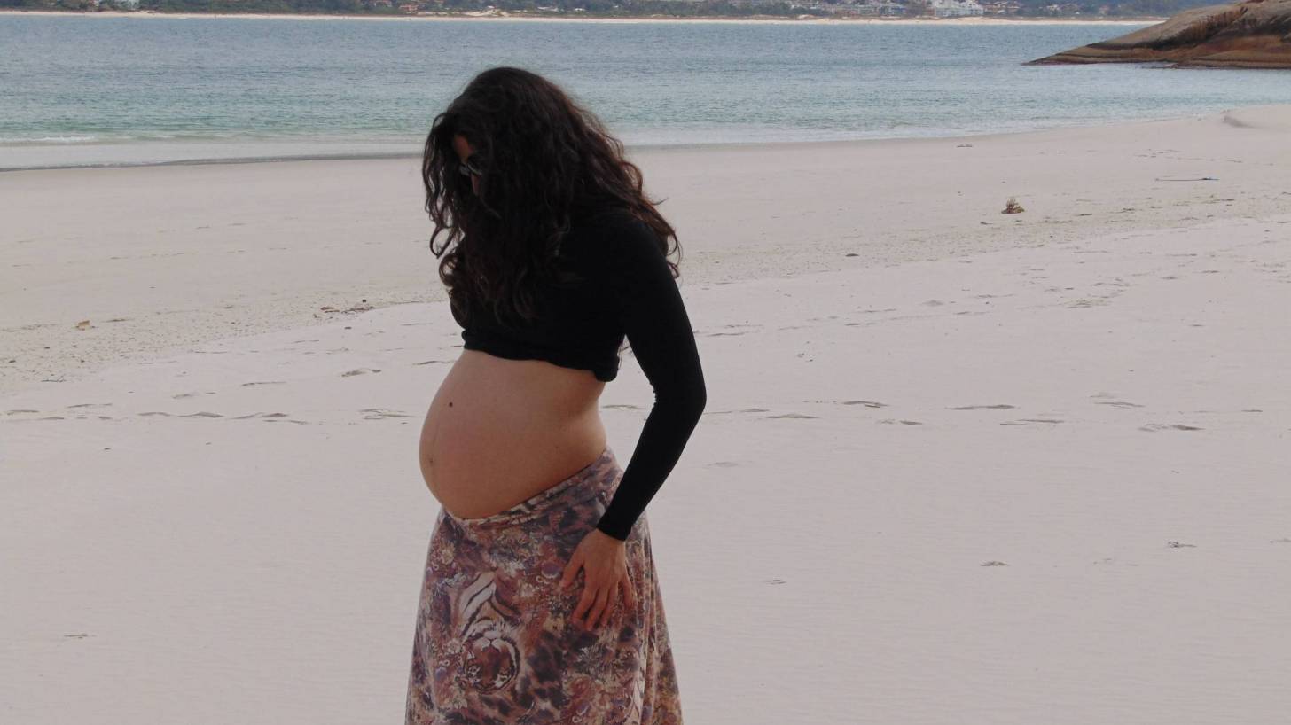 pregnant woman on a beach