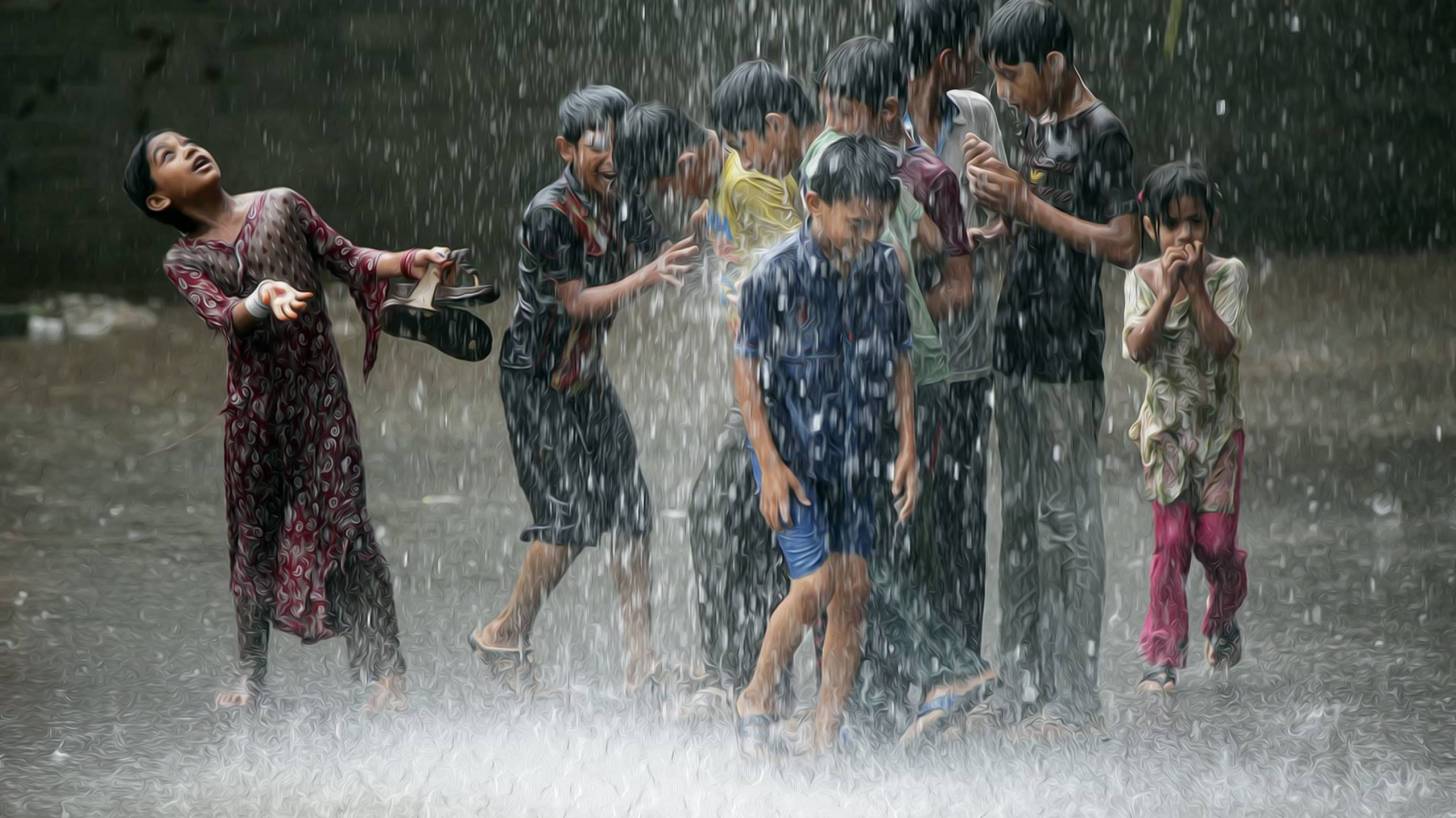 children playing in the rain