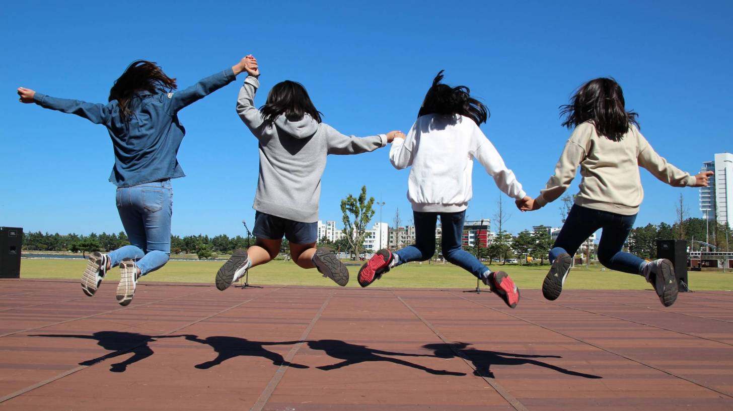 Girls jumping for joy
