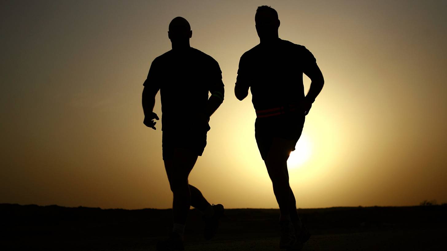 2 men running