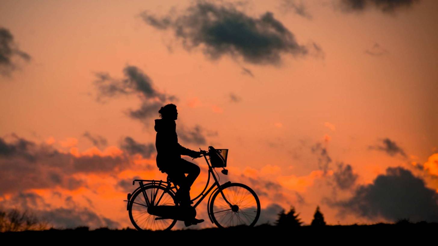 bike rider at sunset