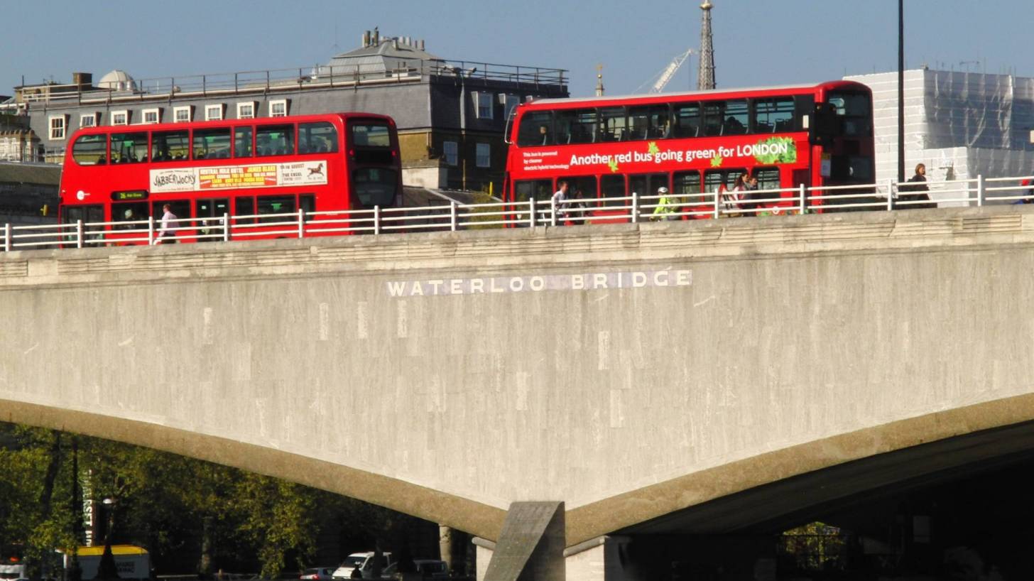 waterloo bridge with double decker buses