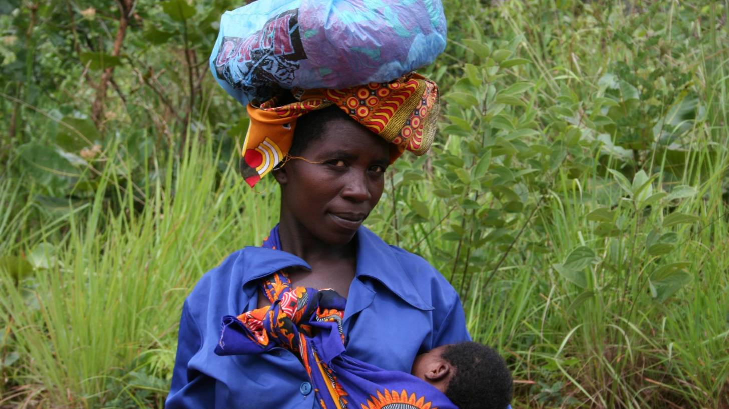 african woman with infant