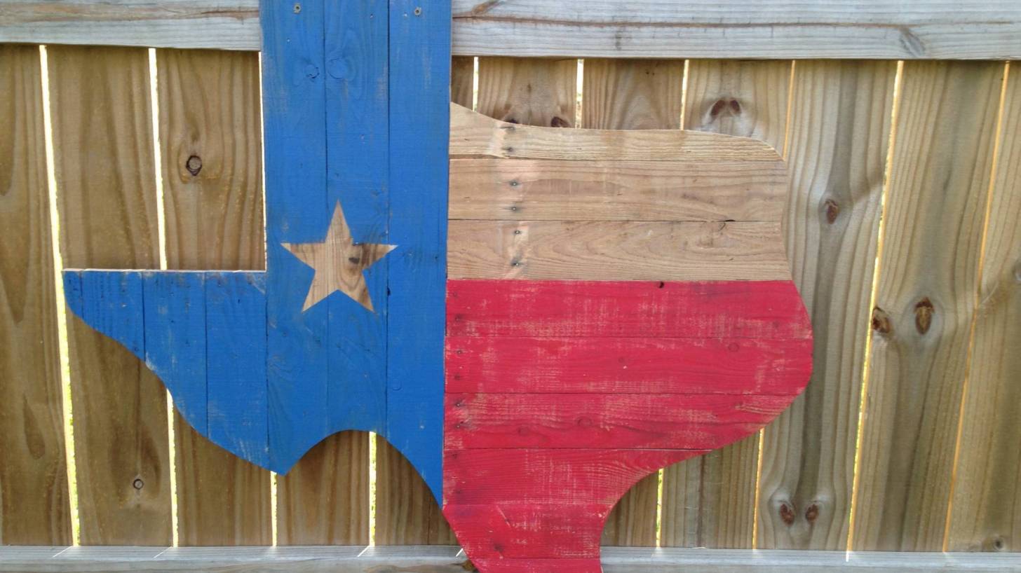texas flag on wooden board