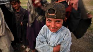 young afghani boy smiling