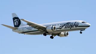 alaska airlines jet in the air