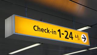 airport check in sign