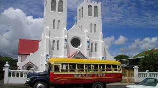 samoan bus parked in front of a church
