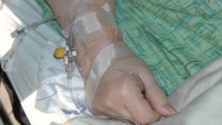 intravenous in a wrist in a hospitl setting