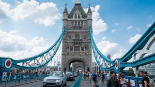 london bridge with people and children walknig on it