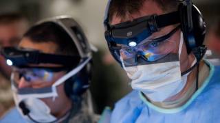 military medical staff with goggles and mask on