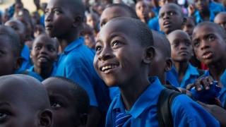young african boys in school uniforms happy and smiling