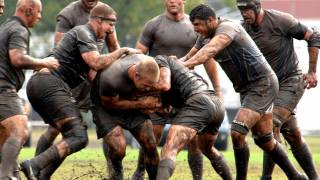 rugby players muddy