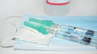 syringes with flu shots in them