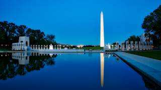 Washington monument and reflecting pool at dusk
