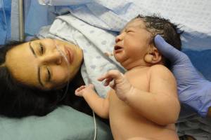 new born baby and mom in the hospital