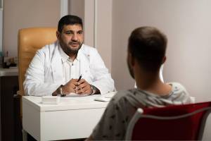 doctor speaking with patient