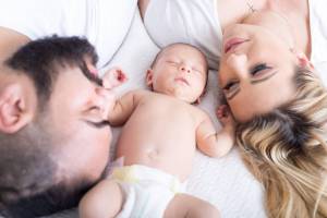 happy healthy family with new baby