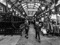 children walking through a london market
