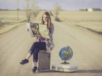 woman traveler looking at a map